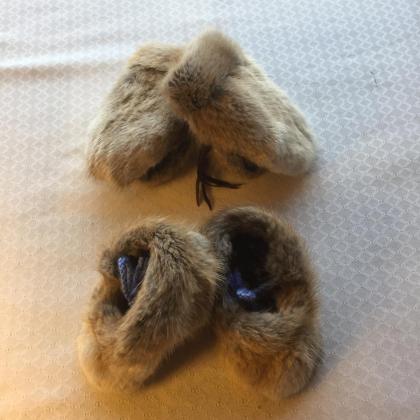 Baby mittens and booties made with muskrat fur, leather and wool