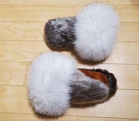 Women's ringed-seal mitts with blue-fox trim and bison-hide plams