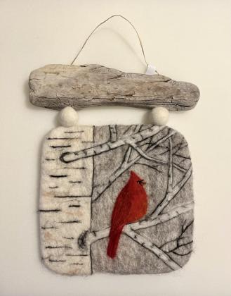 Needle felted cardinal on a wet felted background