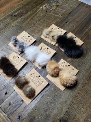 Rabbit and Beaver fur pompom earrings on sterling silver chain and hooks.