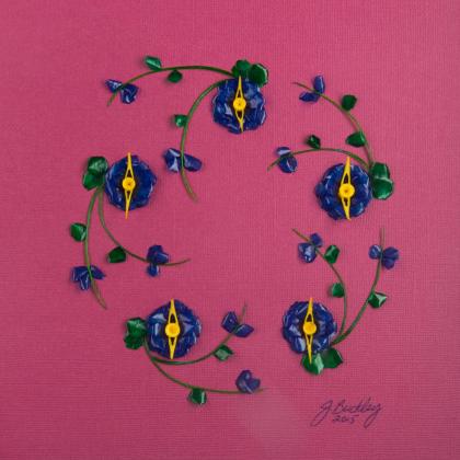 Royal Blue round flowers w yellow fork vertebrae center
