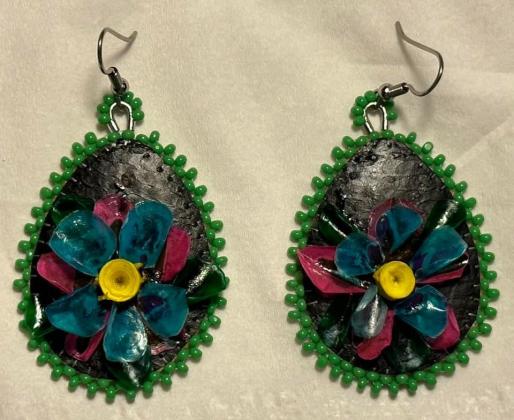 Fish scale flower on dyed black Arctic char, backed with smoke tanned moose hide earrings