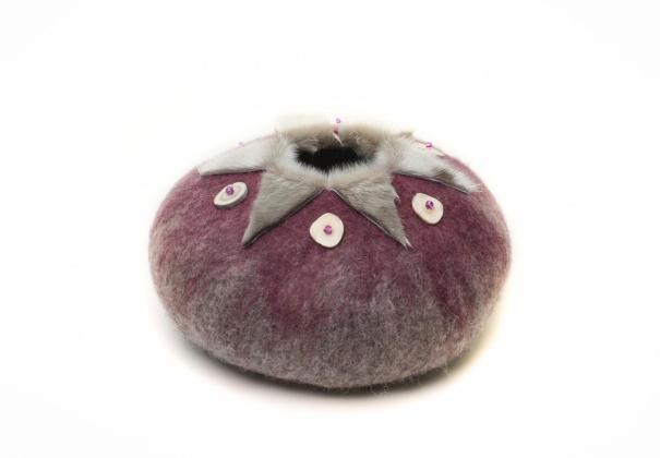 Felted vessel with sealskin accents