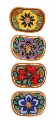 Beaded moosehide change purses in progress