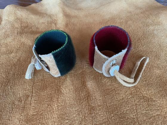 Sealskin bracelets with moosehide ties and beaded edges
