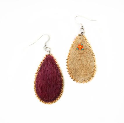 Red sealskin earrings with moosehide on the back