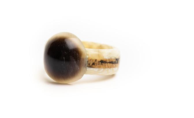 Wedding ring made out of moose antler with a piece of mammoth ivory